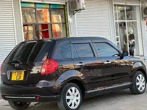 Mazda Verisa 2009 Burgundy