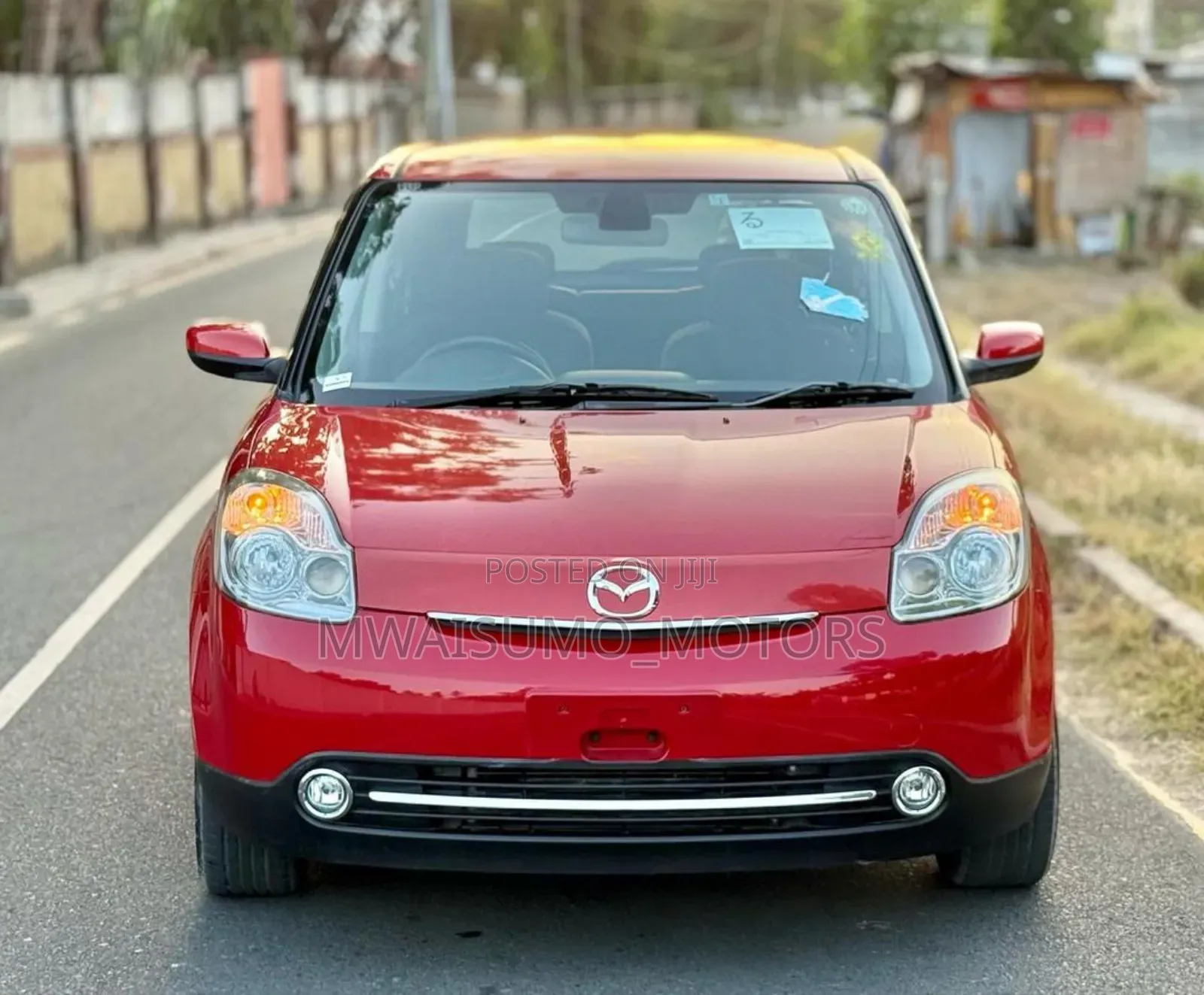 Mazda Verisa 2010 Red