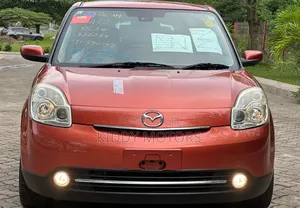 Photo - Mazda Verisa 2009 Red