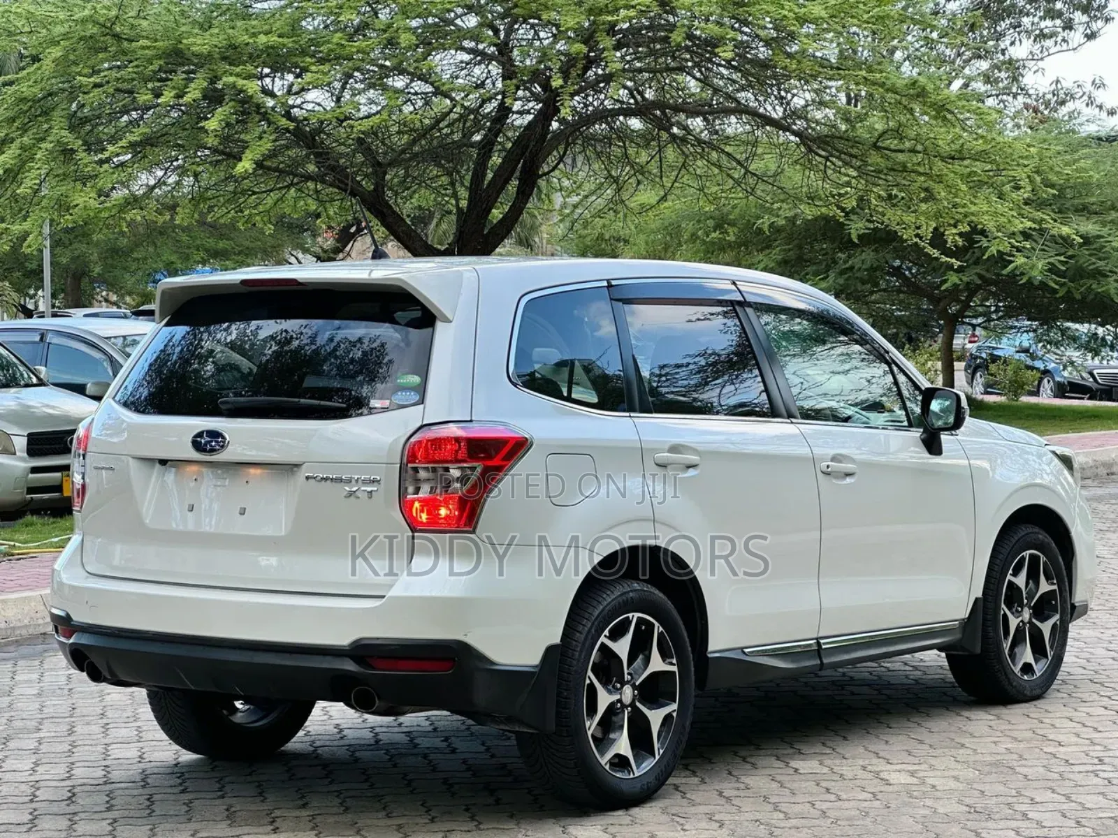 Subaru Forester 2.0XT Touring 4dr SUV AWD (2.0L 4cyl Turbo CVT) 2014 Pearl