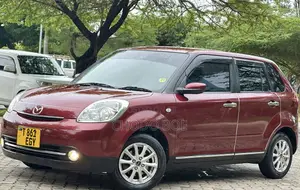 Mazda Verisa 2011 Burgundy