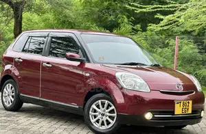 Mazda Verisa 2011 Burgundy