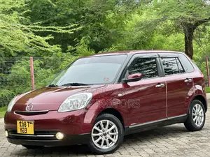 Mazda Verisa 2011 Burgundy