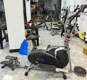Photo - Orbitrac Exercise Bike With Stepper + Twister