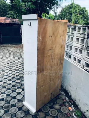 Nauza Kabati La Mbao Milango Miwili Imetumika
