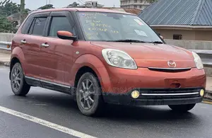 Photo - Mazda Verisa 2009 Orange