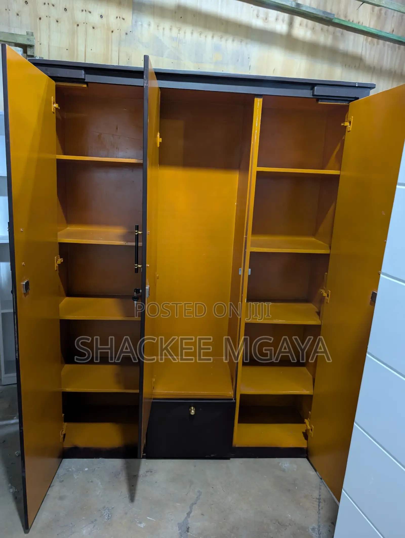 Brown Drawers Three Doors