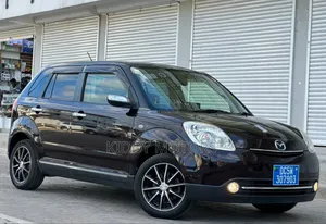 Photo - Mazda Verisa 2009 Beige
