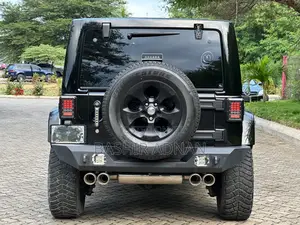 Jeep Wrangler Unlimited Sahara 4dr SUV 4WD (3.6L 6cyl 6M) 2014 Black
