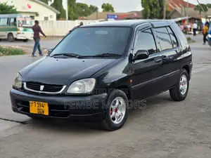Photo - Toyota Raum 2002 Black