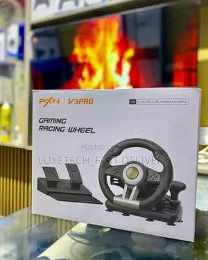 Photo - Steering Wheel and Pedal Set for Racing Games