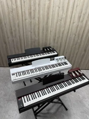 Photo - Digital Piano With Sustain Pedal With Stand Free