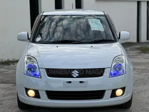 Photo - Suzuki Swift 2008 White