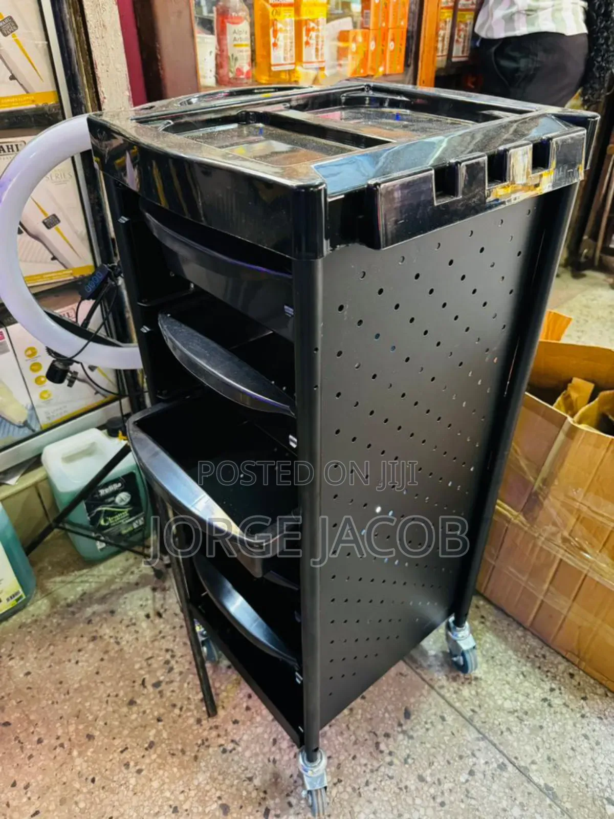 A Salon Rolling Trolley Organizer With Layers