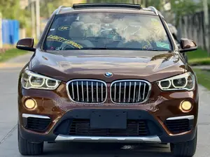 BMW X1 sDrive28i 4dr SUV (2.0L 4cyl Turbo 8A) 2015 Brown