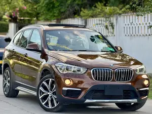 BMW X1 sDrive28i 4dr SUV (2.0L 4cyl Turbo 8A) 2015 Brown