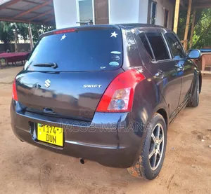 Photo - Suzuki Swift 2004 Gray