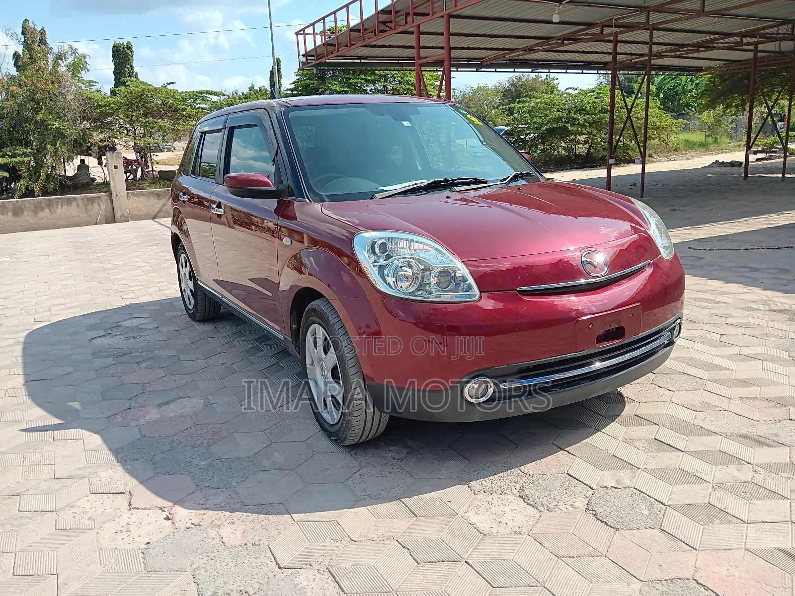 Mazda Verisa 2011 Red