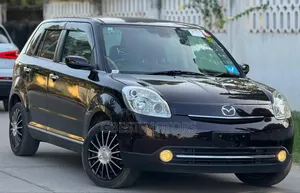 Photo - Mazda Verisa 2007 Brown