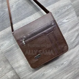 Unisex Bag Material Leather Color Brown