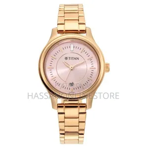 Titan Quartz Analog Rose Gold Rose Gold Metal Strap Watch