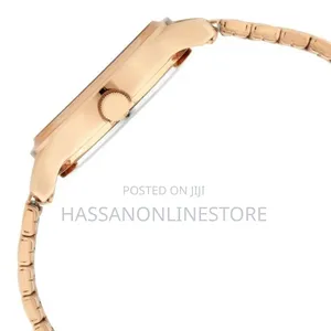 Titan Quartz Analog Rose Gold Rose Gold Metal Strap Watch