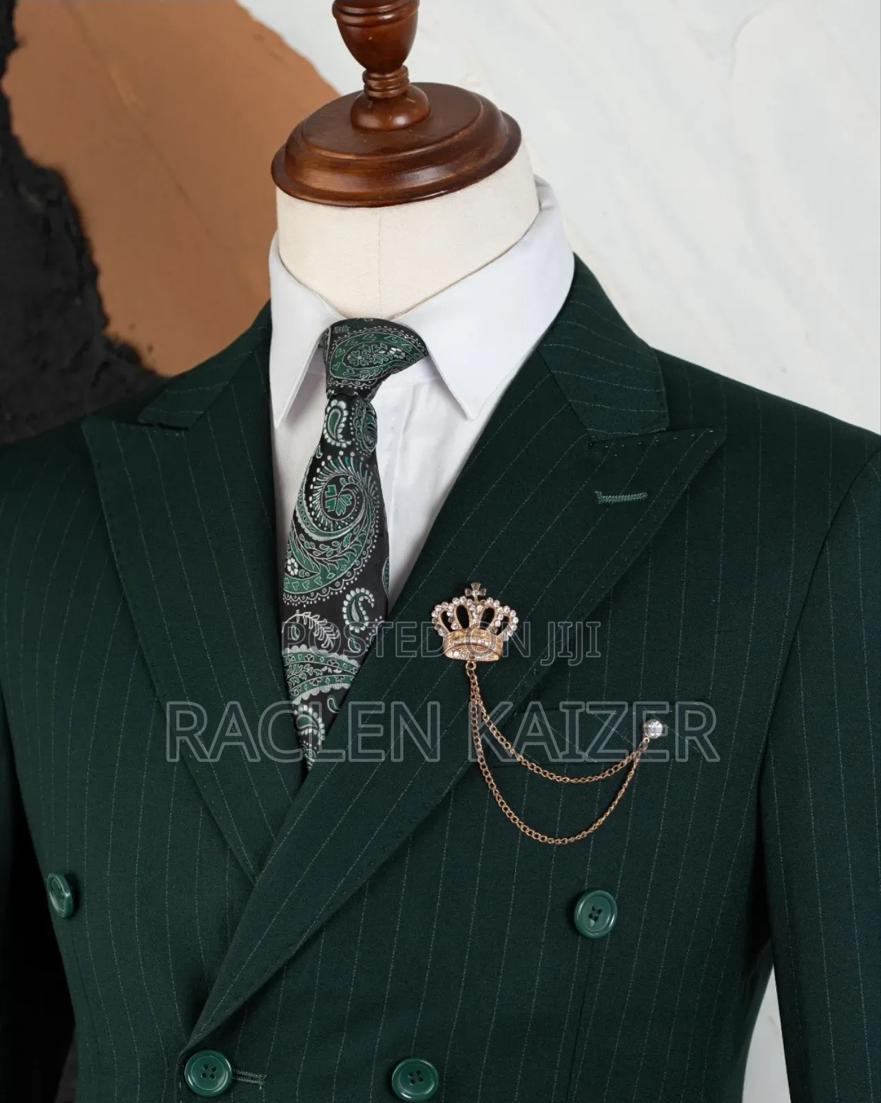 Double-Breasted Green Suit With a Pinstripe Pattern