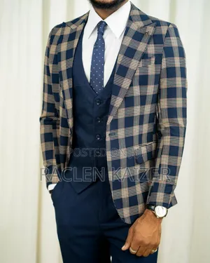 A Navy Suit With Beige Checkered Jacket, Vest, and Navy Trousers