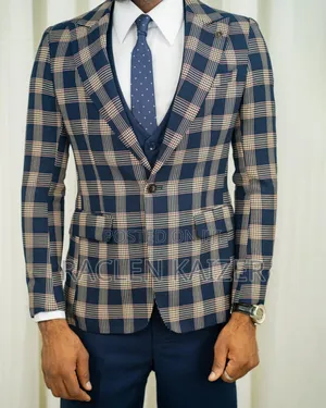 A Navy Suit With Beige Checkered Jacket, Vest, and Navy Trousers