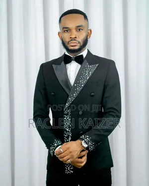 Black Suit With Black Satin Lapels Adorned With Silver Embellishments