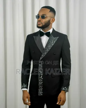 Black Suit With Black Satin Lapels Adorned With Silver Embellishments