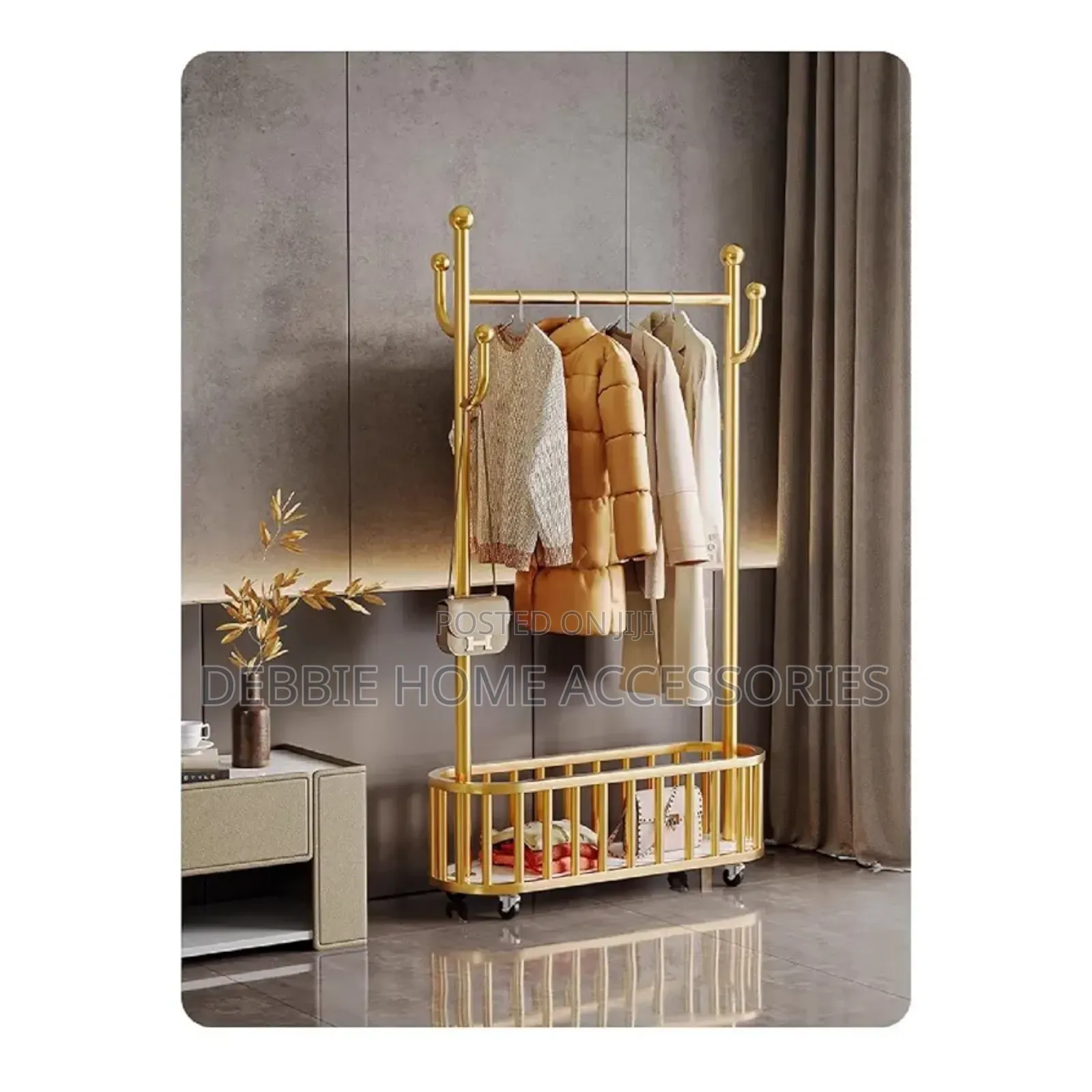 Golden Clothes Rack With a Hanging Rail, Hooks, and a Bottom Storage