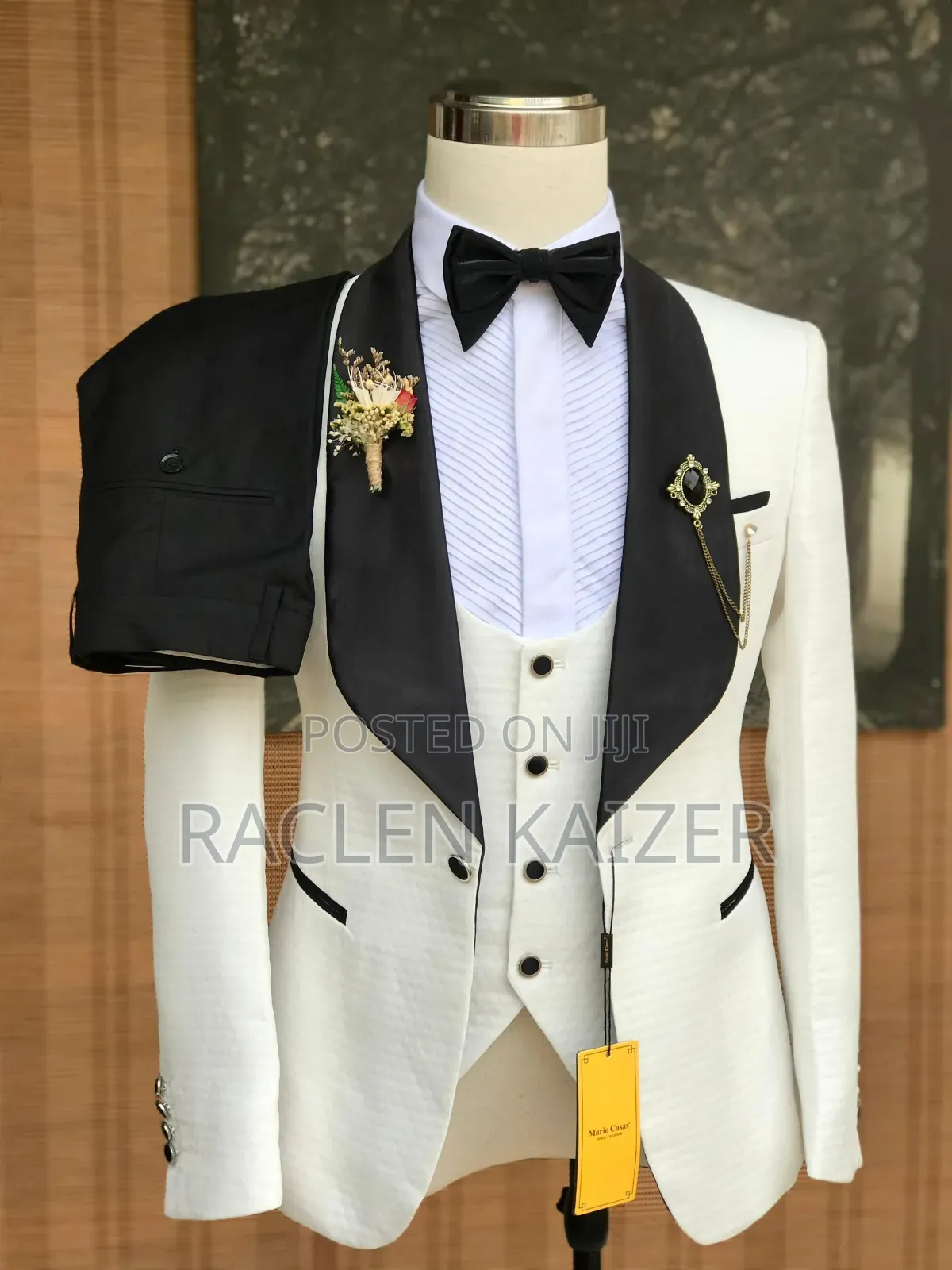 White With Black Accents on the Lapels and Trimmings Suits