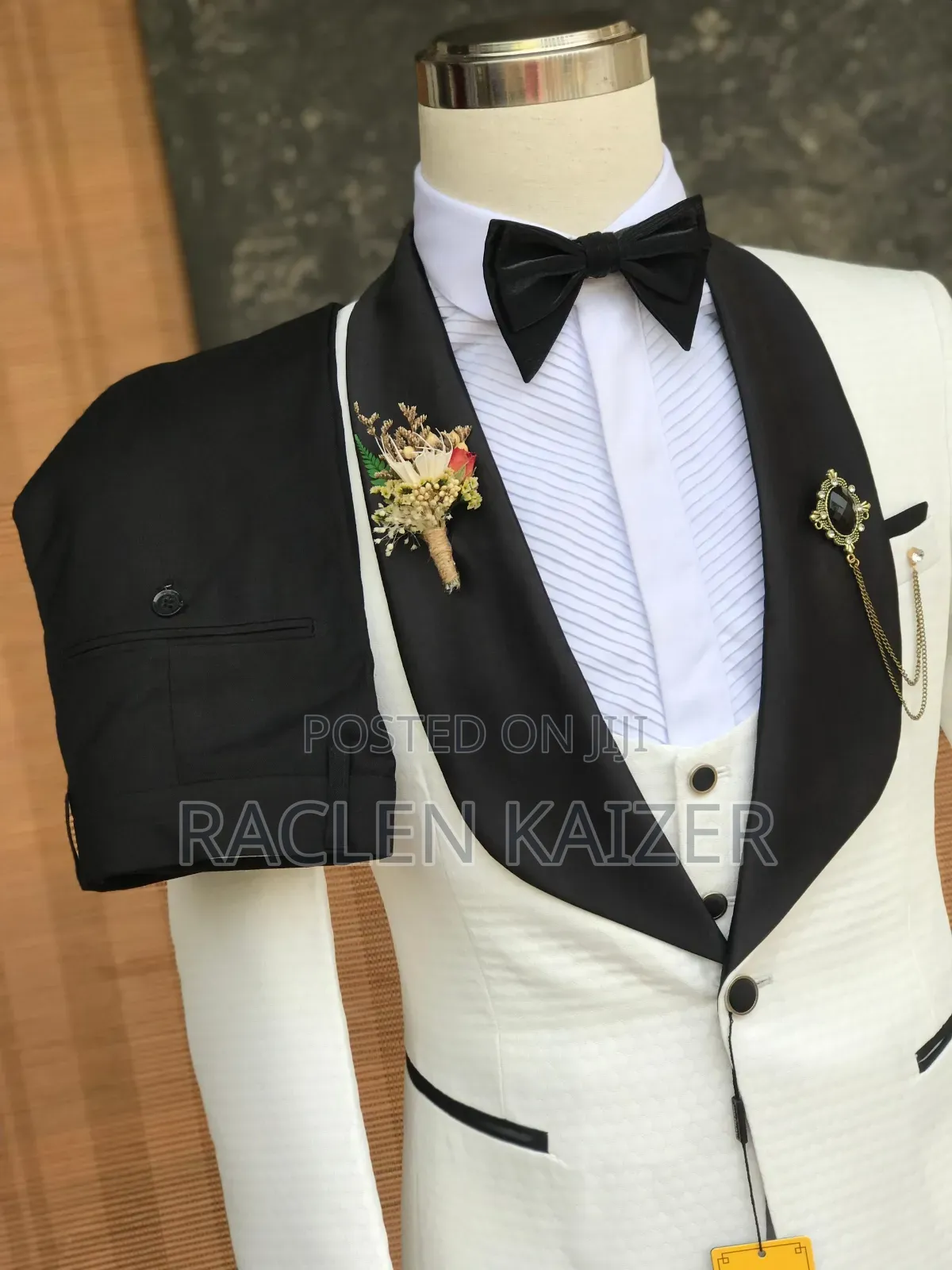 White With Black Accents on the Lapels and Trimmings Suits