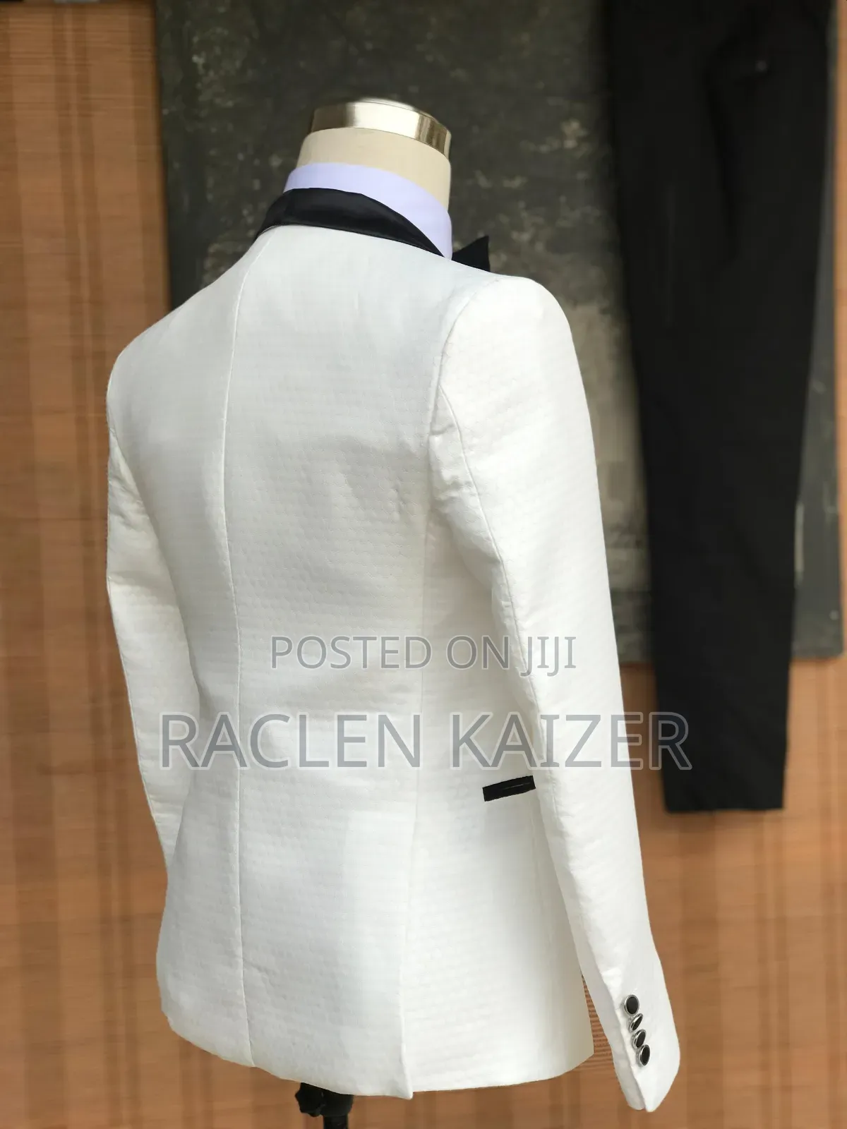 White With Black Accents on the Lapels and Trimmings Suits