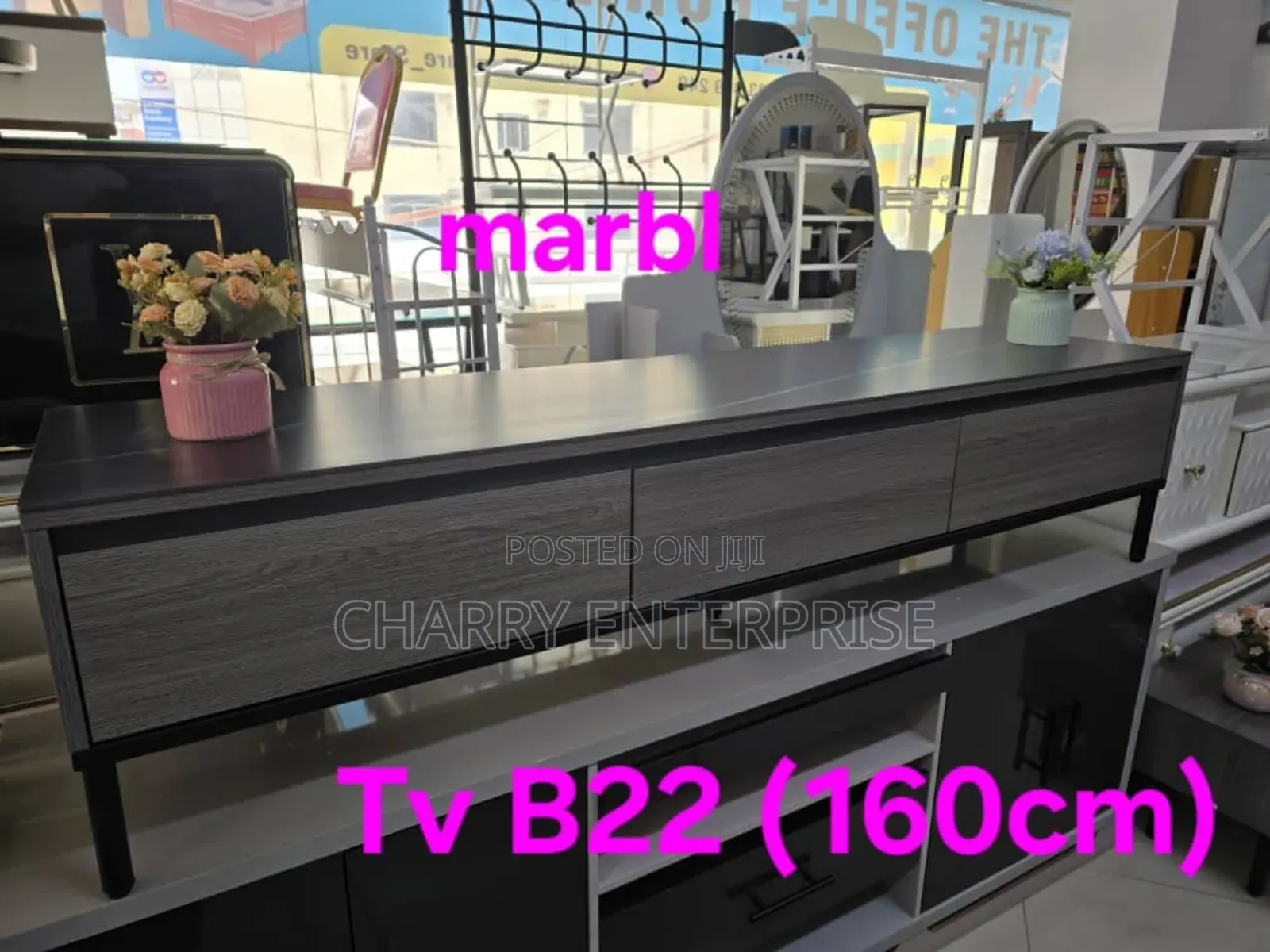 Stylish Showcase for Tv Etc Covered by Marble Material at the Top