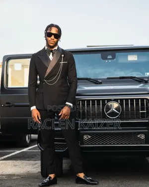 Black Tuxedo Suit With a Gold Chain