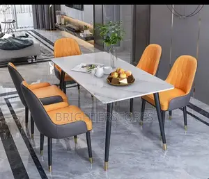 Dinning Table With Orange Chairs