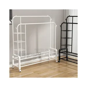 White, Double-Pole Portable Clothes Rack With Multiple Shelves.
