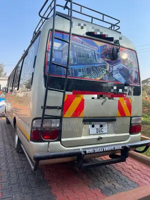 Toyota Coaster 2002 Gold