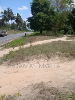 Strategic Road-Front Plot for Sale