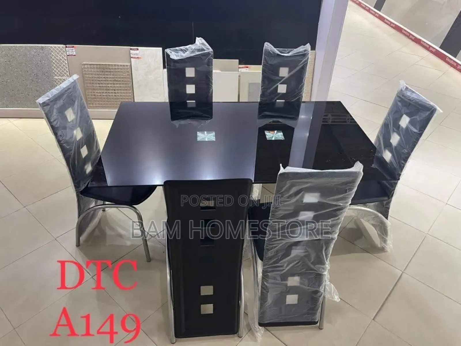 Contemporary 6-Seater Black Glass Dining Set With Designer Chairs