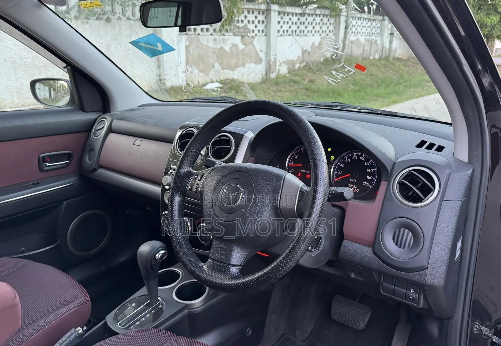 Mazda Verisa 2009 Burgundy