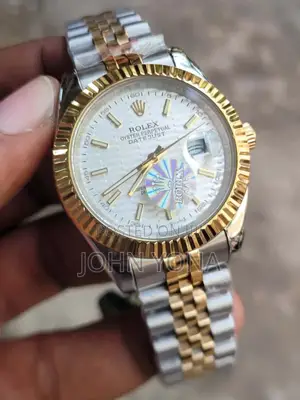 Rolex Oyster Perpetual Datejust Watch With a Two-Tone Gold and Silver