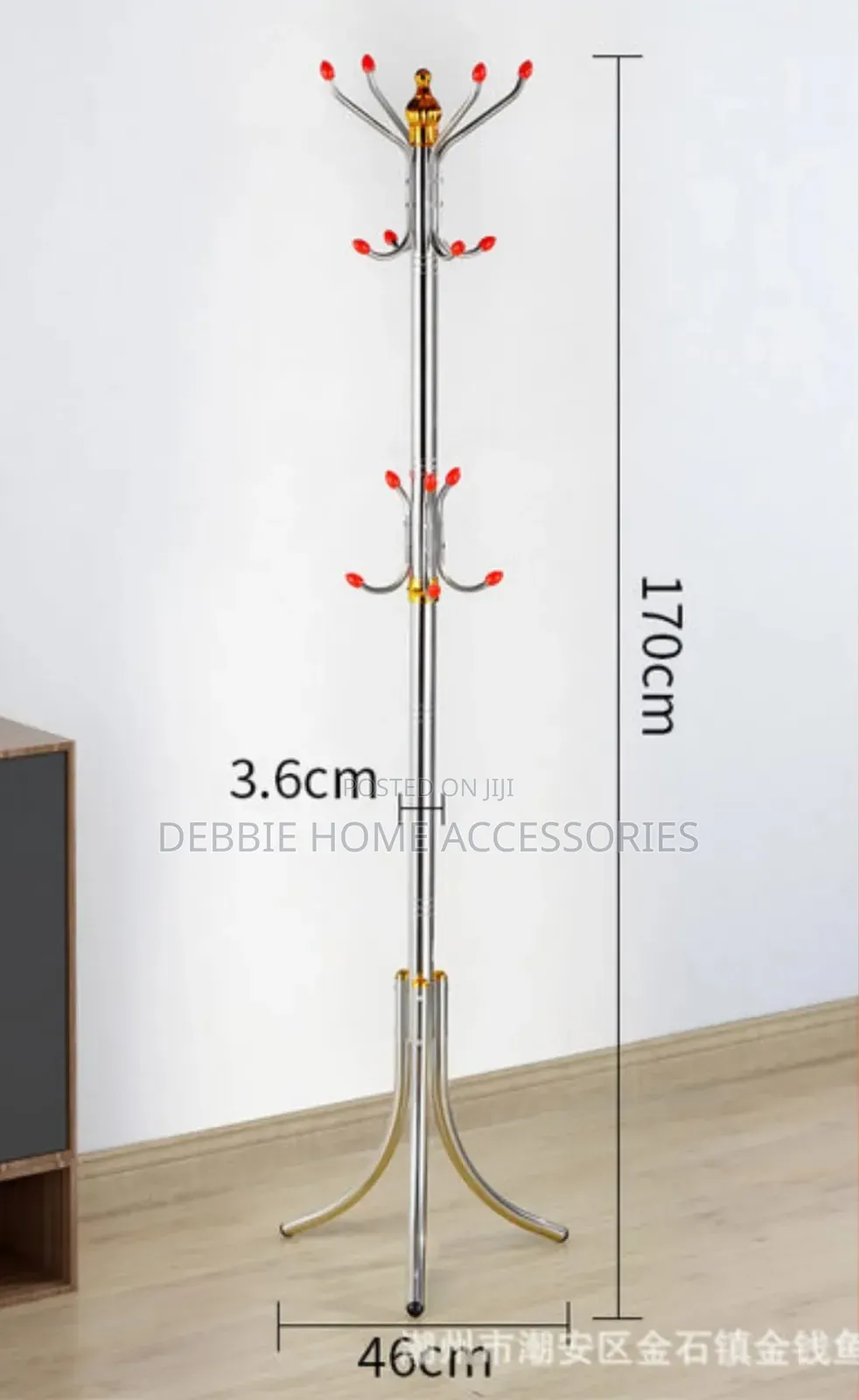 Freestanding Stainless Steel Coat Rack With Multiple Hooks.