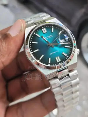 Citizen Tsuyosa Automatic Nj0151-88x Watch With a Blue Sunray Dial