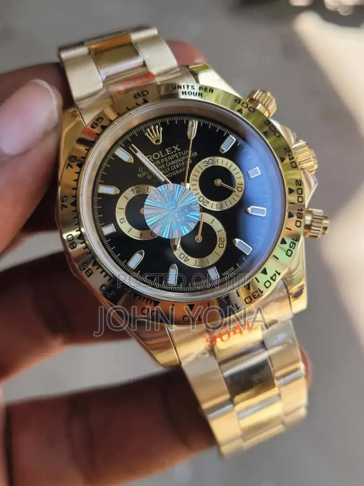 Rolex Oyster Perpetual Cosmograph Daytona Gold Case and a Black Dial