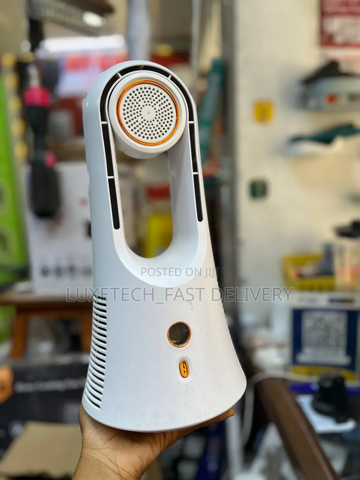 Portable Mini Bladeless Tower Fan Used on a Desk or Tabletop