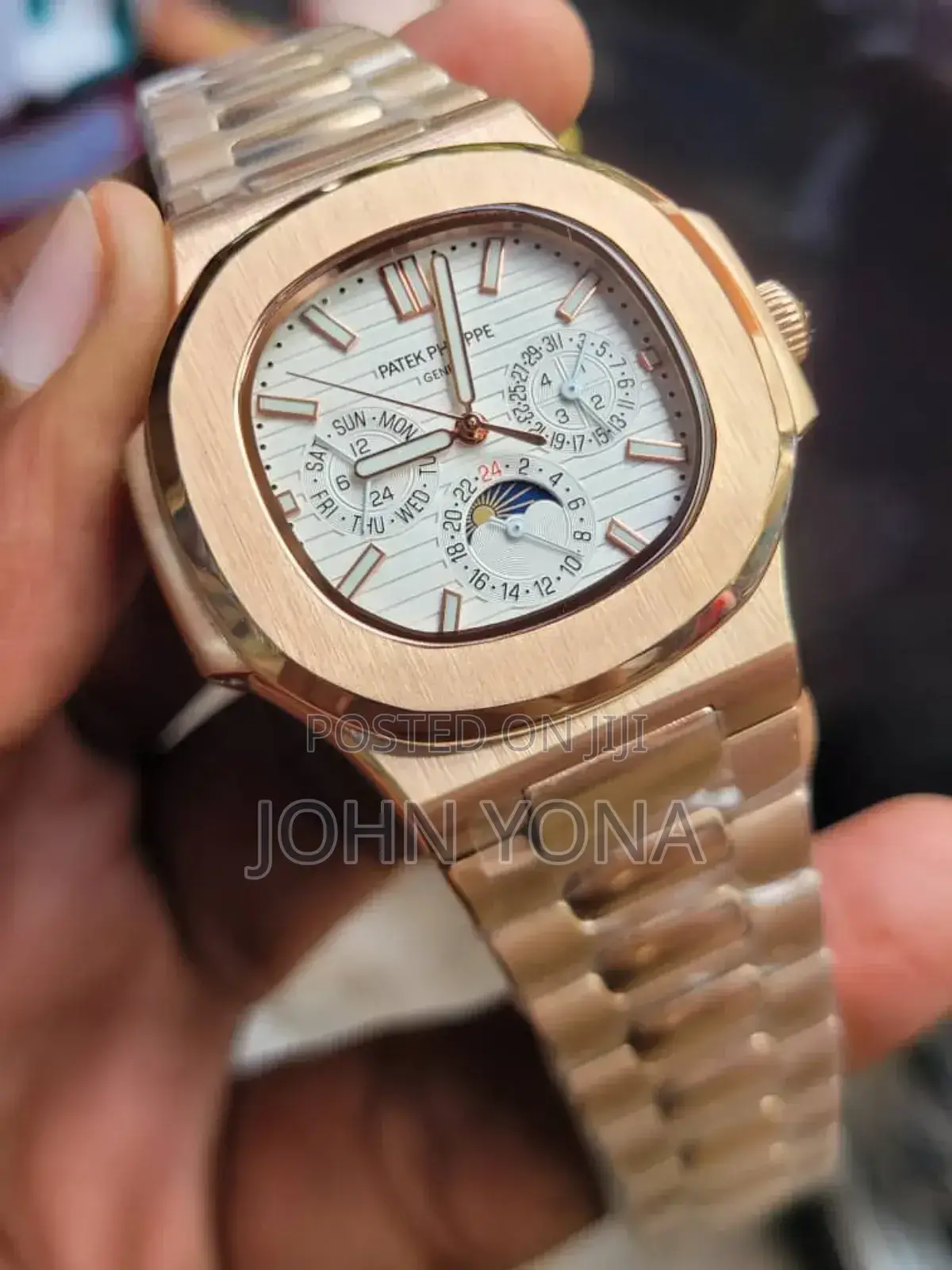 Patek Philippe Nautilus in Rose Gold With a White Sunburst Dial