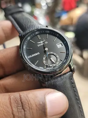 Domino Men's Watch With a Black Dial and a Black Leather Band.